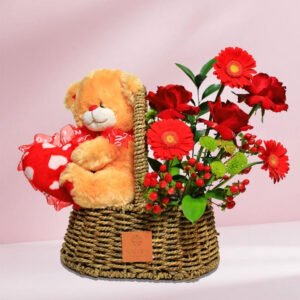teddy love basket – red roses, gerberas & hypericum arrangement