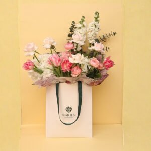 soft pink rose & tulip bouquet in signature white bag