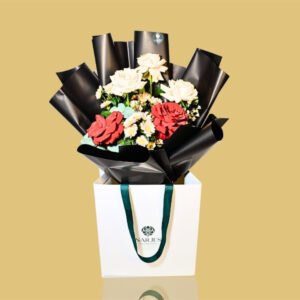 red & beige rose bouquet in signature white bag
