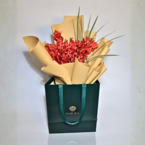 red vanda orchid rustic bouquet in green bag