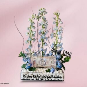 chic blue floral arrangement with money acrylic and topper