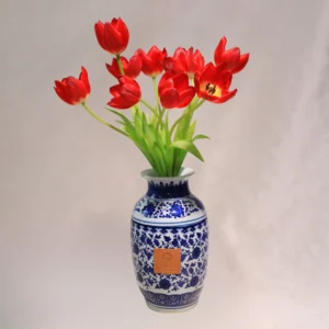 classic red tulips in chinese ceramic vase