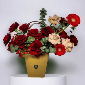 red & cappuccino roses with gerberas in brown bag